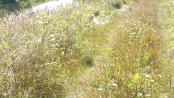 A casual passerby young guy saw a naked Milf sunbathing on river bank. Peeping. Spy camera. Naked in public. Nude beach. Wild beach