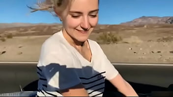 Sexy naked blonde Eva Elfie sucks a guy in the car