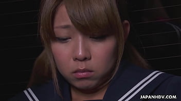 Japanese brunette girl Fu Sazanami with a shaved pussy in uniform masturbates with a guy uncensored