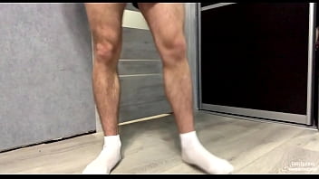 Muscular guy Jerking off his cock with white SOCKS and cums on black SOCKS! Foot fetish!