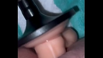 Shaved milf gets pounded by machine