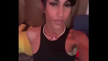 Young Sissy Tgirl Crossdressing in Sexy Black Cheerleader Outfit