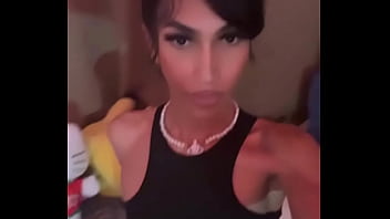 Young Sissy Tgirl Crossdressing in Sexy Black Cheerleader Outfit