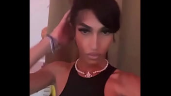 Young Sissy Tgirl Crossdressing in Sexy Black Cheerleader Outfit