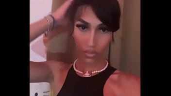 Young Sissy Tgirl Crossdressing in Sexy Black Cheerleader Outfit