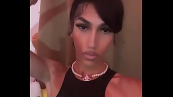 Young Sissy Tgirl Crossdressing in Sexy Black Cheerleader Outfit