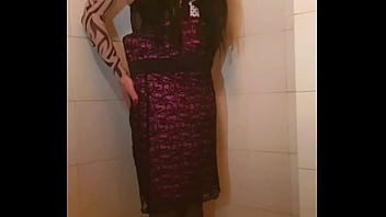 Transvestite slips out of her dress