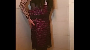 Transvestite slips out of her dress