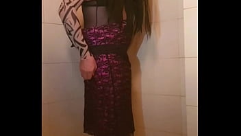 Transvestite slips out of her dress
