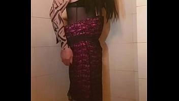 Transvestite slips out of her dress