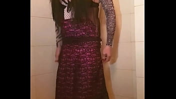 Transvestite slips out of her dress