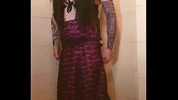 Transvestite slips out of her dress