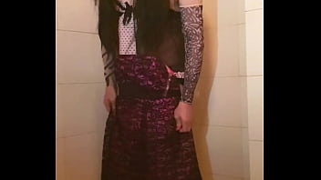 Transvestite slips out of her dress