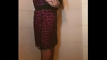 Transvestite slips out of her dress