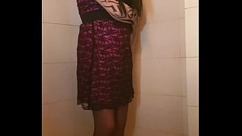 Transvestite slips out of her dress