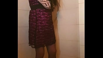 Transvestite slips out of her dress