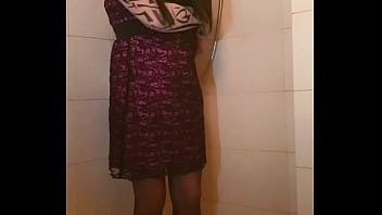 Transvestite slips out of her dress