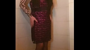 Transvestite slips out of her dress