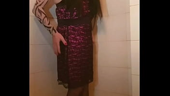 Transvestite slips out of her dress