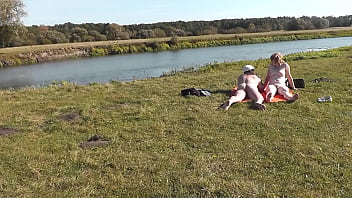 Wild beach. Nudist beach. Outdoors on bank of river lover fucks doggystyle beautiful sexy MILF Frina. Oudoor. Ouside. Naked in public. Sex in public