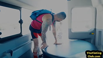 Tattooed hunky top fisting lubed asshole during duo in van