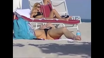 Exhibitionist Wife 56 - Lana flashing her MEATY PUSSY and BIG TITS on a PUBLIC beach!  There is always a Voyeur around!