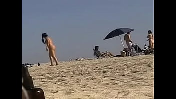 Exhibitionist Wife 19 - Anjelica teasing random voyeurs at a public beach by flashing her shaved cunt!