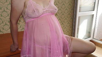 Photoshoot of a pregnant milf. Pepper in a hairy pussy, tight ass in a thong, slender legs in stockings and a big belly in a sexy dress. Close-ups and different poses.