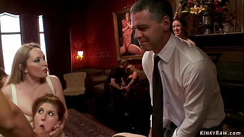 Slaves tied back to back at party