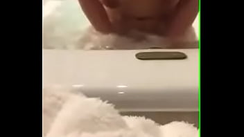 Chinese big tits showers with and takes in cum