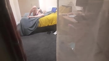 Girl caught masturbating through the window