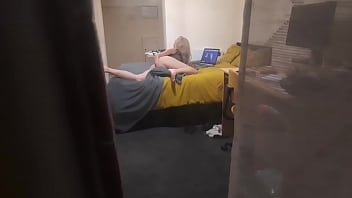 Girl caught masturbating through the window