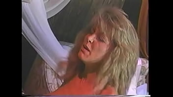 Lecherous blonde bean flicker with big melons in white lingerie asked her dyke girlfriend Sharon Kane sbout romantic night and she was rewarded with anal dildo drilling and strap-on pussy pounding at one time