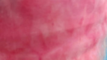 Nicoletta goes shopping and in the dressing room she gets her sports shorts completely wet. Want to spy on her?