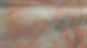 Nicoletta goes shopping and in the dressing room she gets her sports shorts completely wet. Want to spy on her?