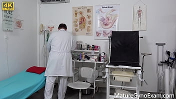 Horny MILF with beautiful pussy lips cumming hard in gyno chair