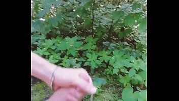 Boys blowjob on the workout area in a public park