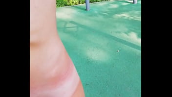 Boys blowjob on the workout area in a public park