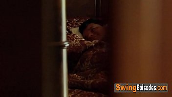 Sensual vibes in a room full of kinky swingers having a softcore orgy.