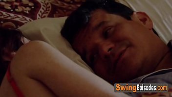 Sensual vibes in a room full of kinky swingers having a softcore orgy.