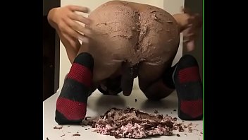 Hot black ass sitting on Raspberry Chocolate Cake