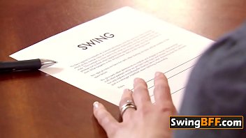 Kinky swinger couple is having softcore sex in front of the cameras.