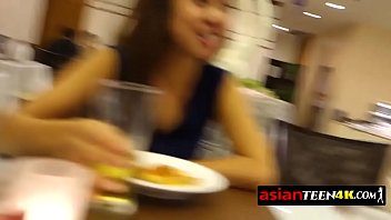 Submissive petite Asian teen is sucking a stranger&#039_s big cock!