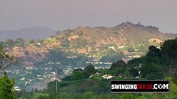 Two hot swinger ladies are kissing and having oral sex during this wild orgy.