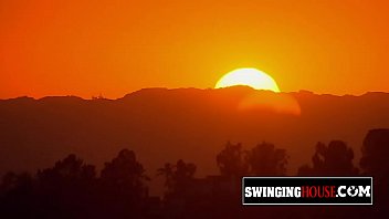 Two hot swinger ladies are kissing and having oral sex during this wild orgy.