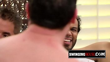 Two hot swinger ladies are kissing and having oral sex during this wild orgy.