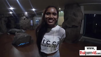 Asian teen girlfriend gives boyfriend an oiled handjob