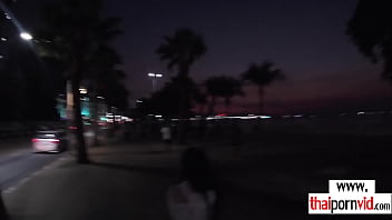 Asian teen girlfriend gives boyfriend an oiled handjob