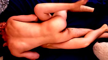 Funny young couple making love at home