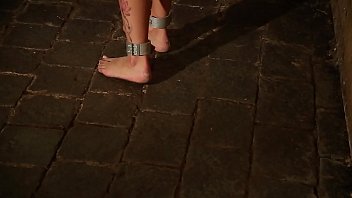 Luna chained nude in the stables